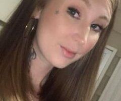 Hilton Head escorts - tattoos on this sweet busty red head