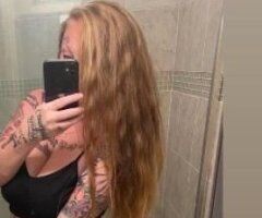 Hilton Head escorts - busty red haired white girl with tattoos on hhi