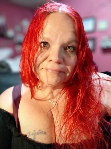 Cincinnati Female Escort — redhead with 42G breasts, loves giving head - 1
