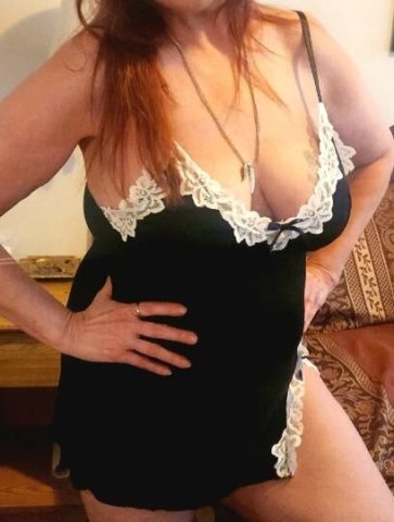 Upscale Mature Blue-Eyed Brunette Escort (In-Call) - 1