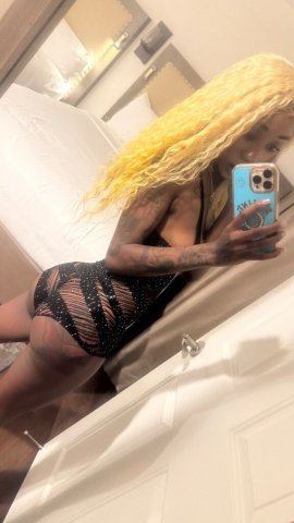 Petite Brownskin Escort With Burgundy Hair - 1