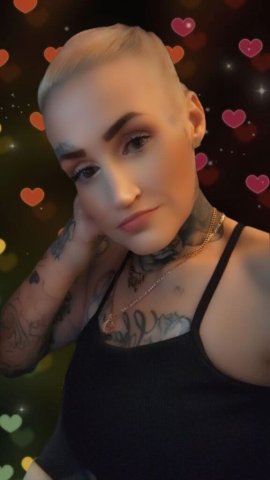 Wichita KS Female Escort — long legs, dark tan, tatted up - 1