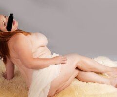 Fredericksburg escorts - Busty redhead for a fun, relaxing time — outcall only